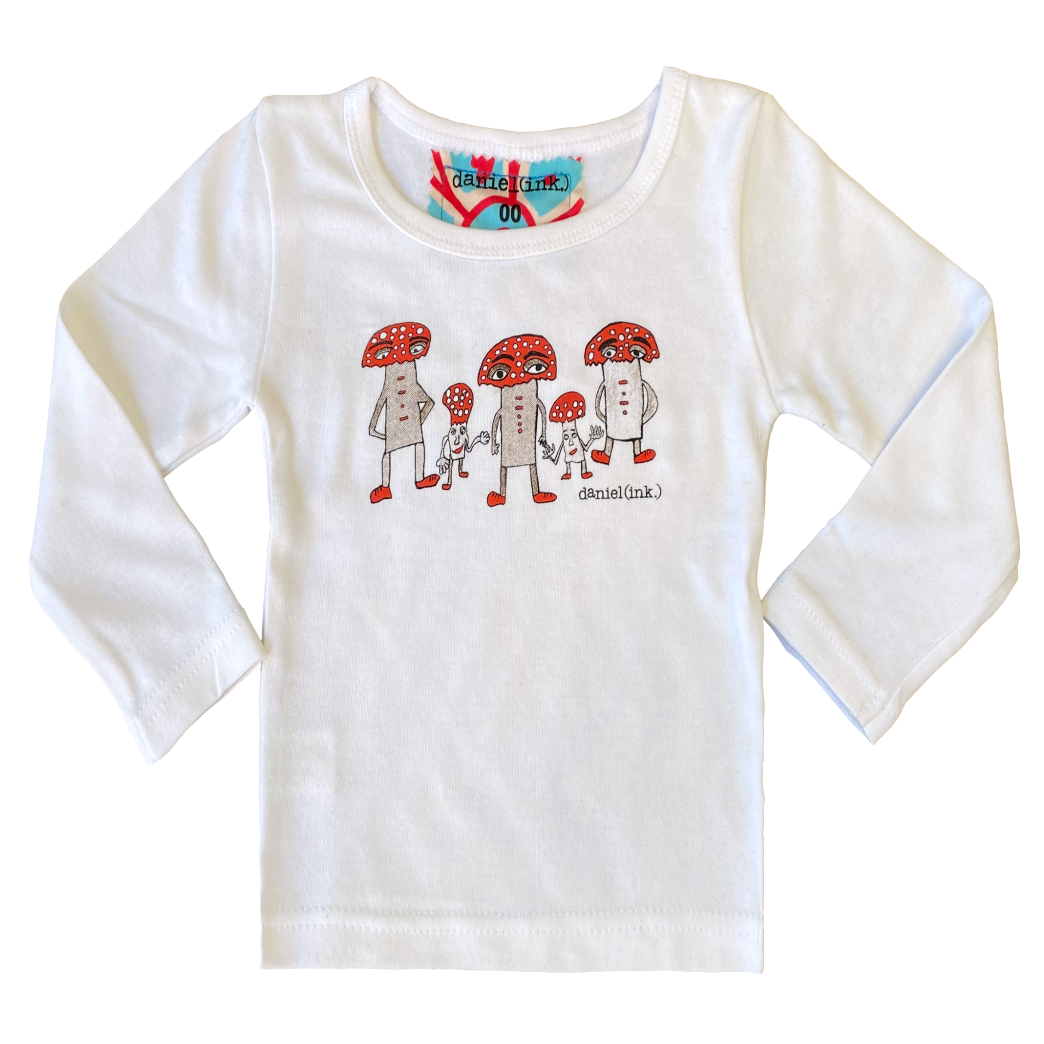 White long sleeve babies' shirt featuring a hand drawn image of three large and two small mushroom humanoid figures. The mushroom figures have red heads and red shoes and red buttons which spell "magic" in morse code. The t-shirt has a red, white, and blue fabric label on the back of the neck.