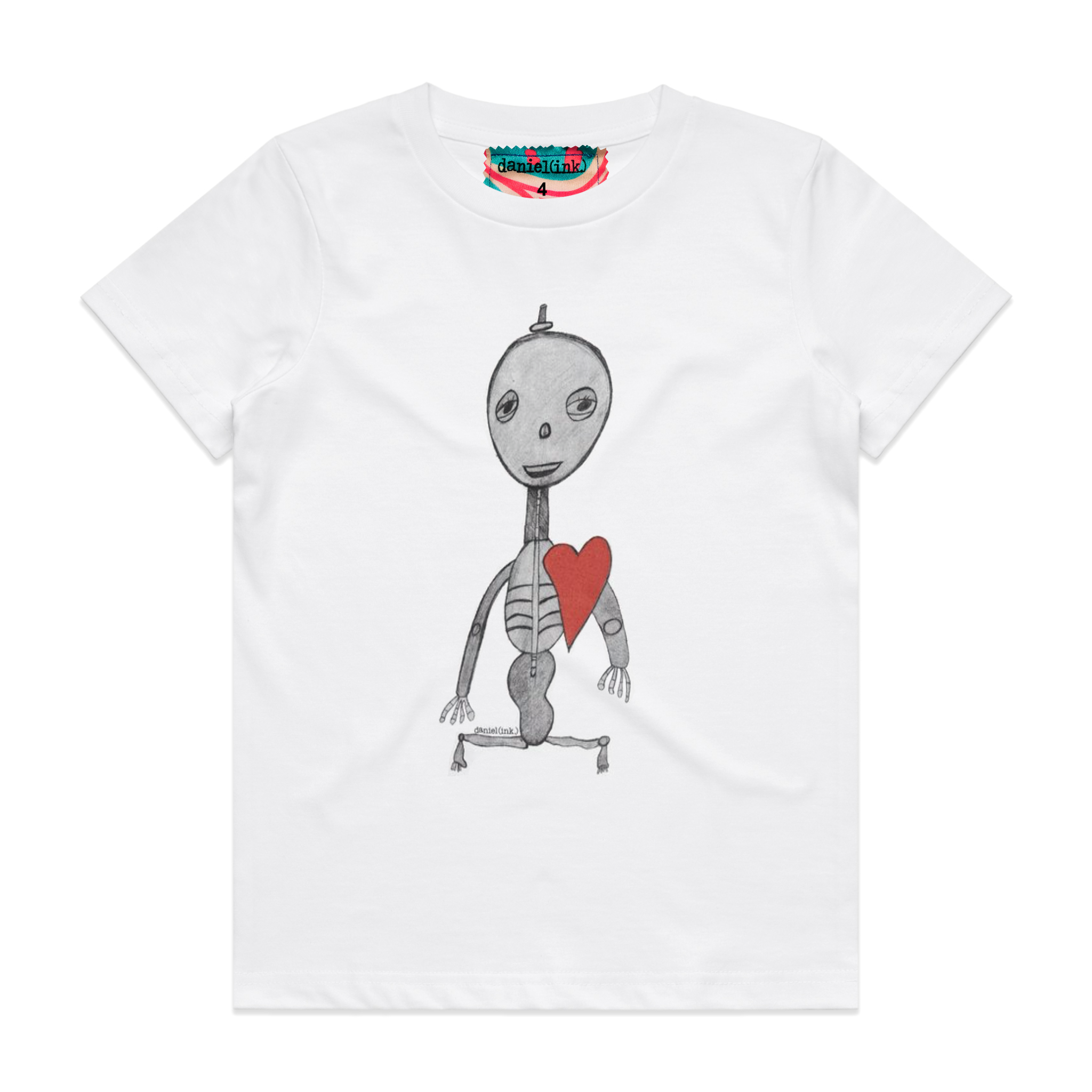 White kids' t-shirt featuring a hand drawn sketch of a skeleton with a red heart. The t-shirt has a red, white, and blue fabric label on the back of the neck.