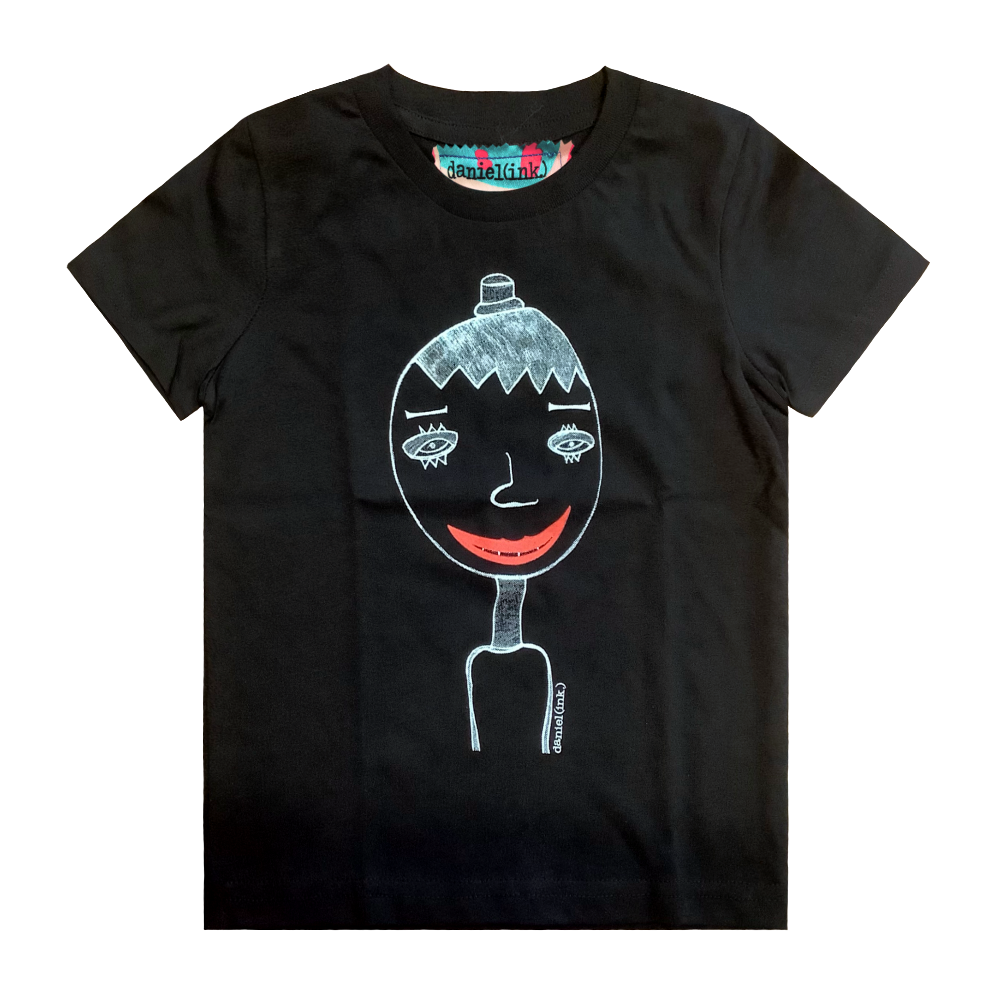 Black kids' t-shirt featuring a hand drawn sketch of a person in white. The person is wearing a small top hat and has big red lips in a big smile. This t-shirt has a red, white, and blue fabric label on the back of the neck.