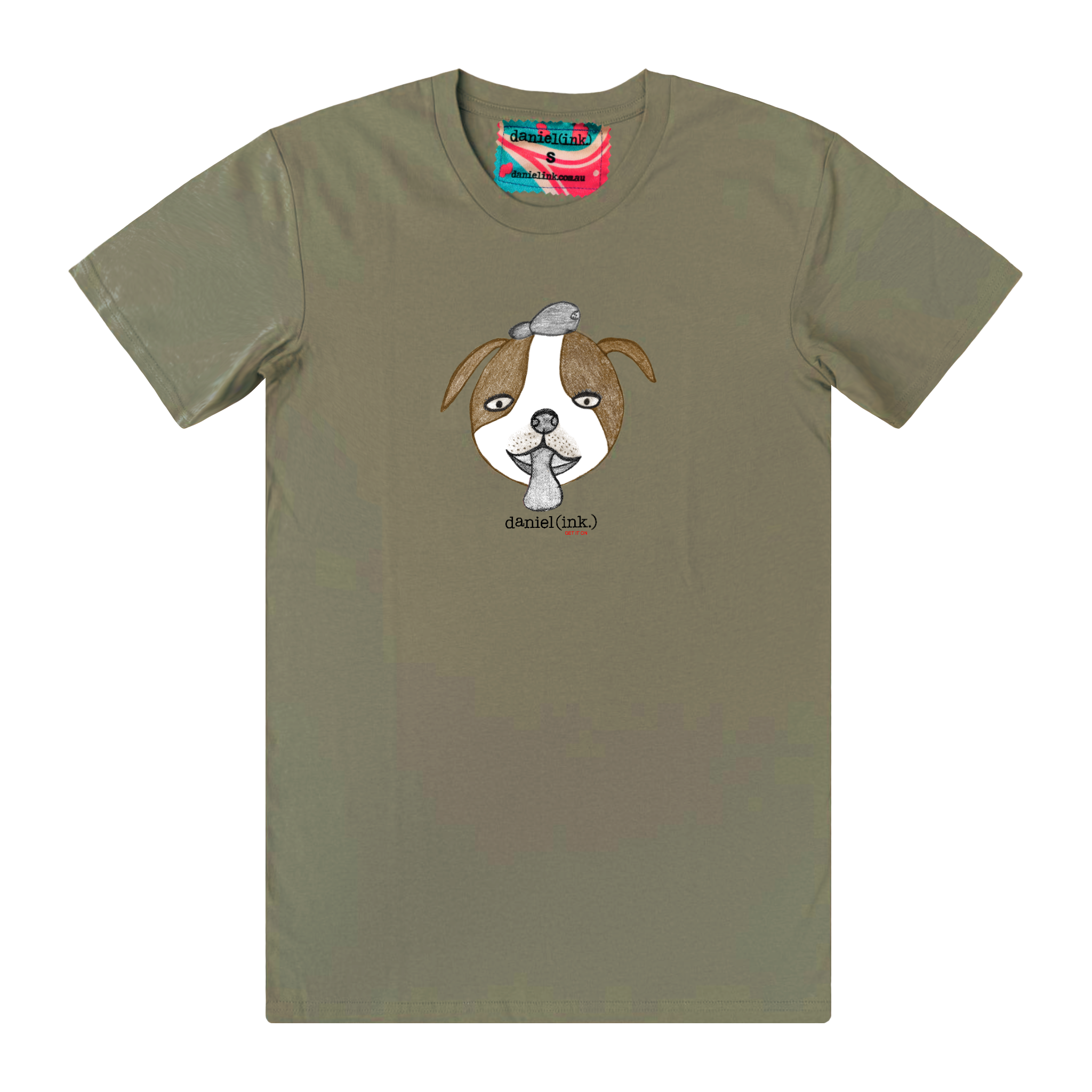 Men's eucalyptus colour t-shirt featuring a hand drawn sketch of a dog’s face in brown and white. The dog has a round head, floppy ears, wide eyes, and its tongue is sticking out. The t-shirt has a red, white, and blue fabric label on the back of the neck.