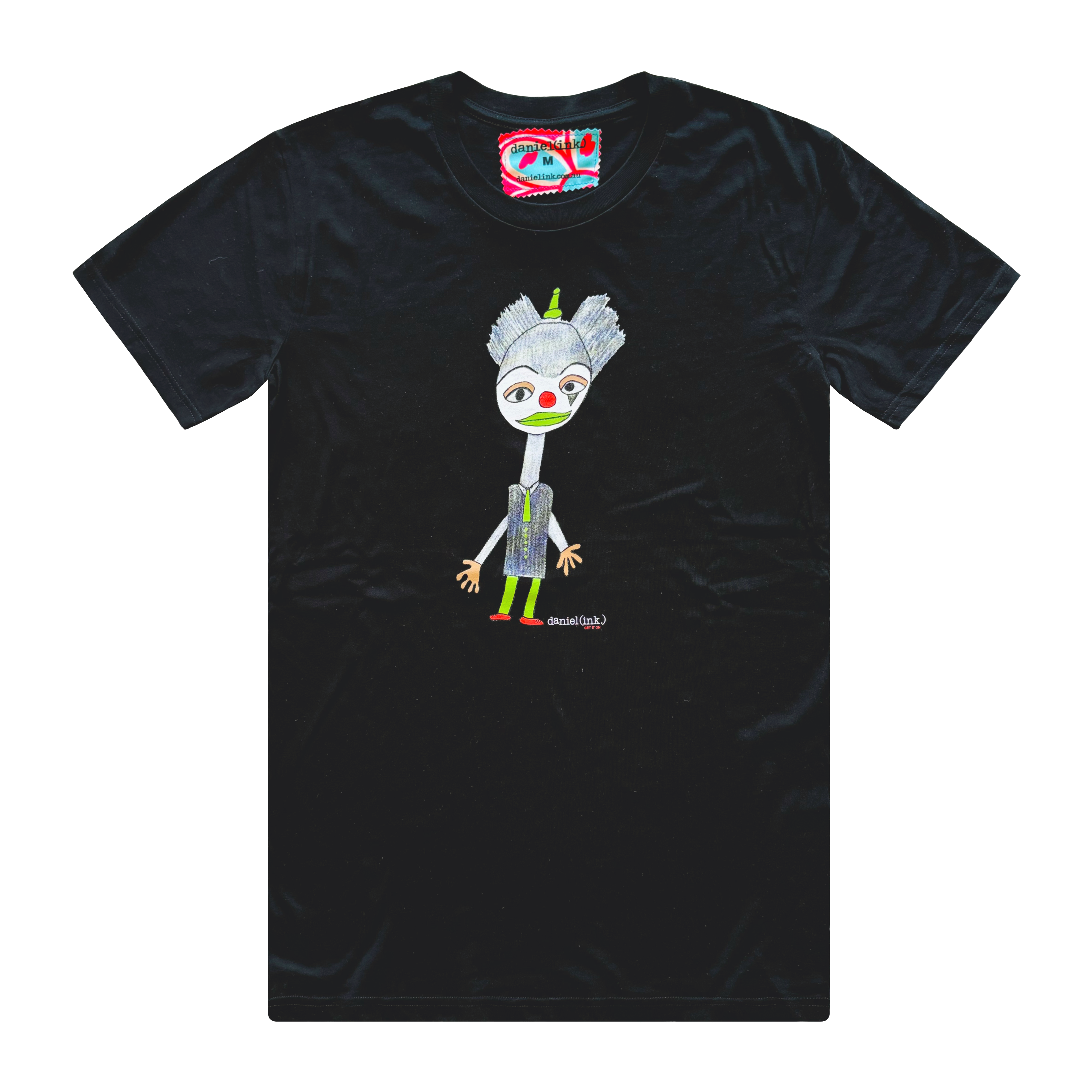 Men's black t-shirt featuring a hand drawn image of a colourful clown. The clown has a red nose and shoes; a green hat, lips, tie, buttons, and legs; and gold eye shadow and gloves. This t-shirt has a red, white, and blue fabric label on the back of the neck.
