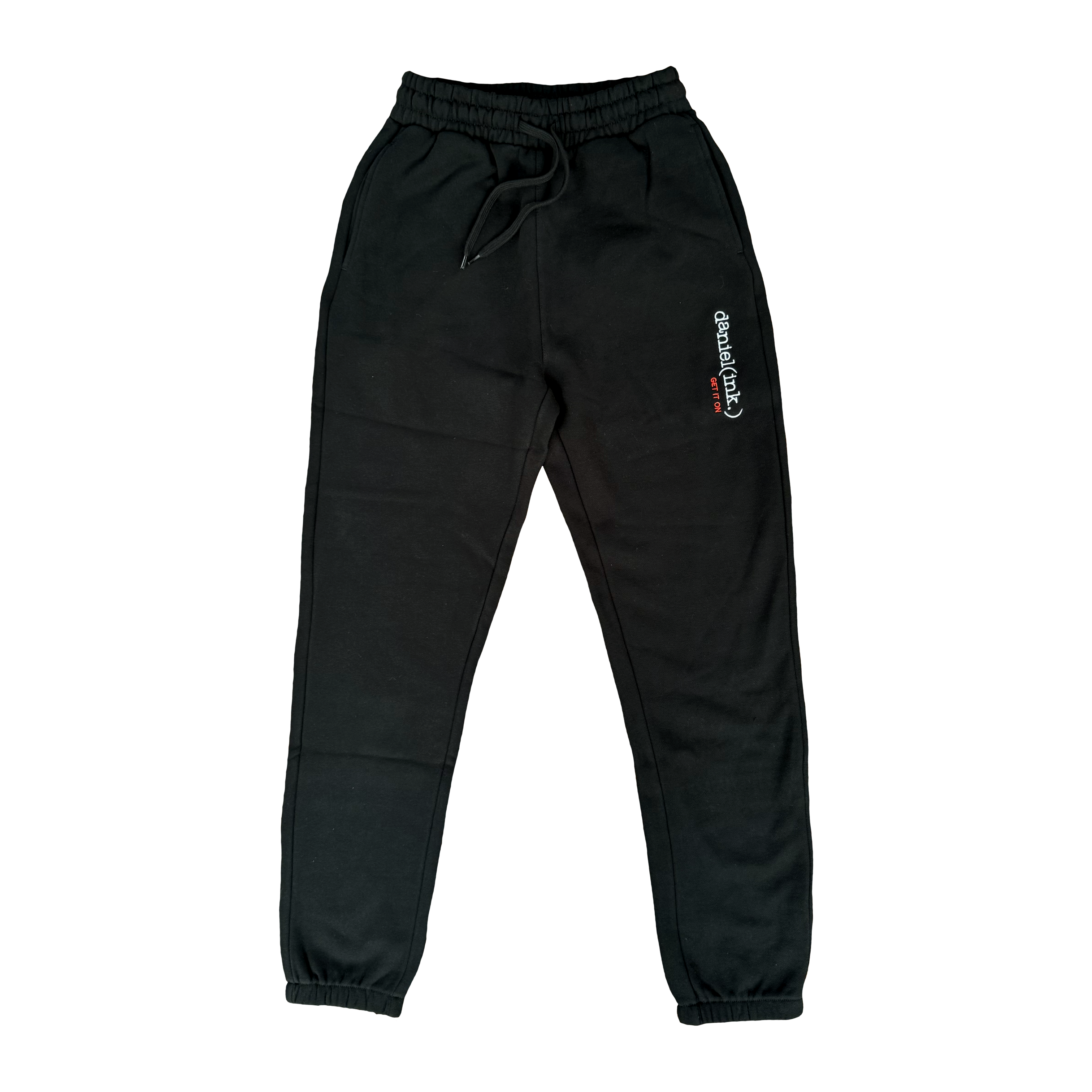 Black track pants featuring the daniel(ink.) logo embroidered in silver and the slogan "get it on" embroidered in red underneath it on the upper left thigh.