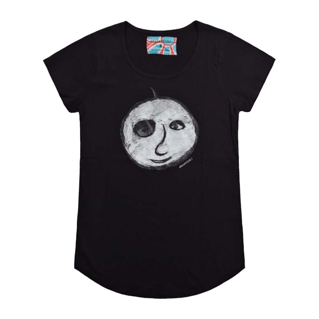 Black short sleeve women's t-shirt featuring a hand drawn charcoal sketch of an apple with a face in black and white. The t-shirt has a red, white, and blue fabric label on the back of the neck.