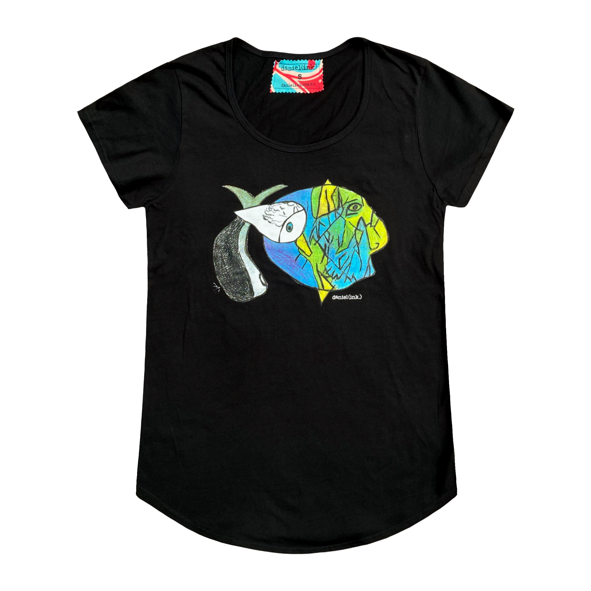Women's black t-shirt featuring an abstract drawing of three fishes swimming together. The design features a large yellow, green, and blue fish on the right; a small grey fish in the middle; and another larger grey and white fish on the left. This t-shirt has a red, white, and blue fabric label on the back of the neck.
