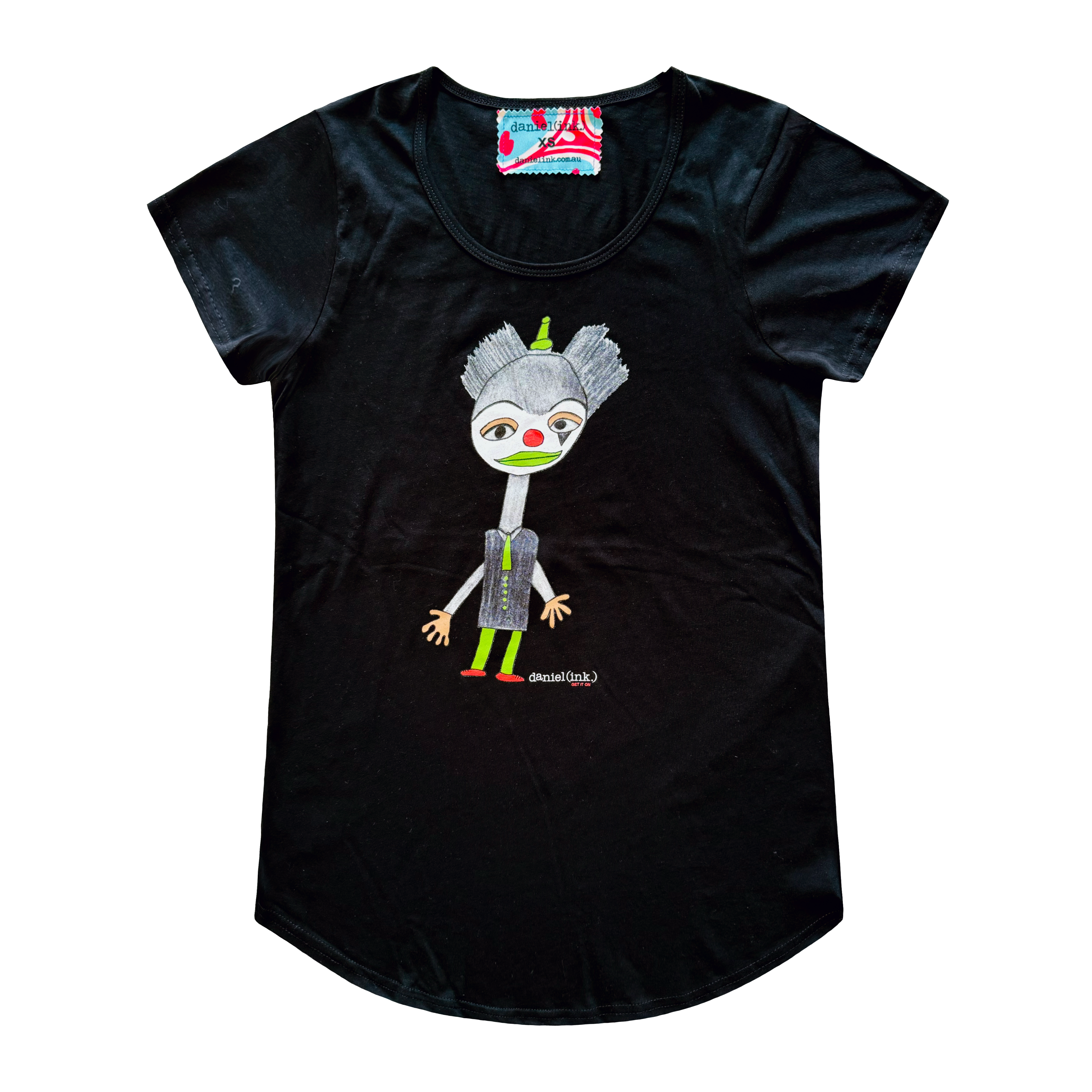 Women's black t-shirt featuring a hand drawn image of a colourful clown. The clown has a red nose and shoes; a green hat, lips, tie, buttons, and legs; and gold eye shadow and gloves. This t-shirt has a red, white, and blue fabric label on the back of the neck.
